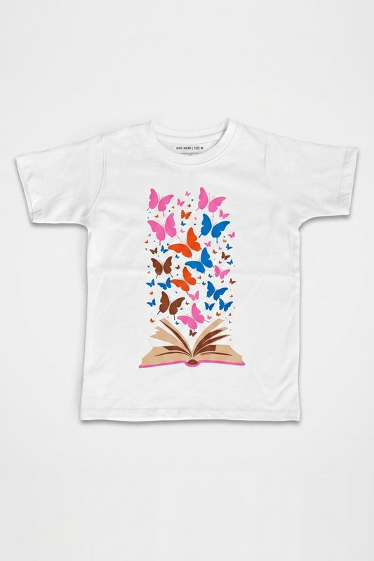 White t-shirt with a colorful butterfly design on an open book